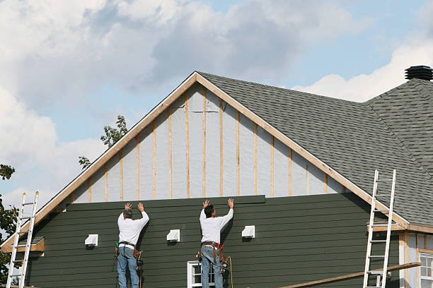 Professional Emergency Siding Repair technician working in Oak Hall, VA